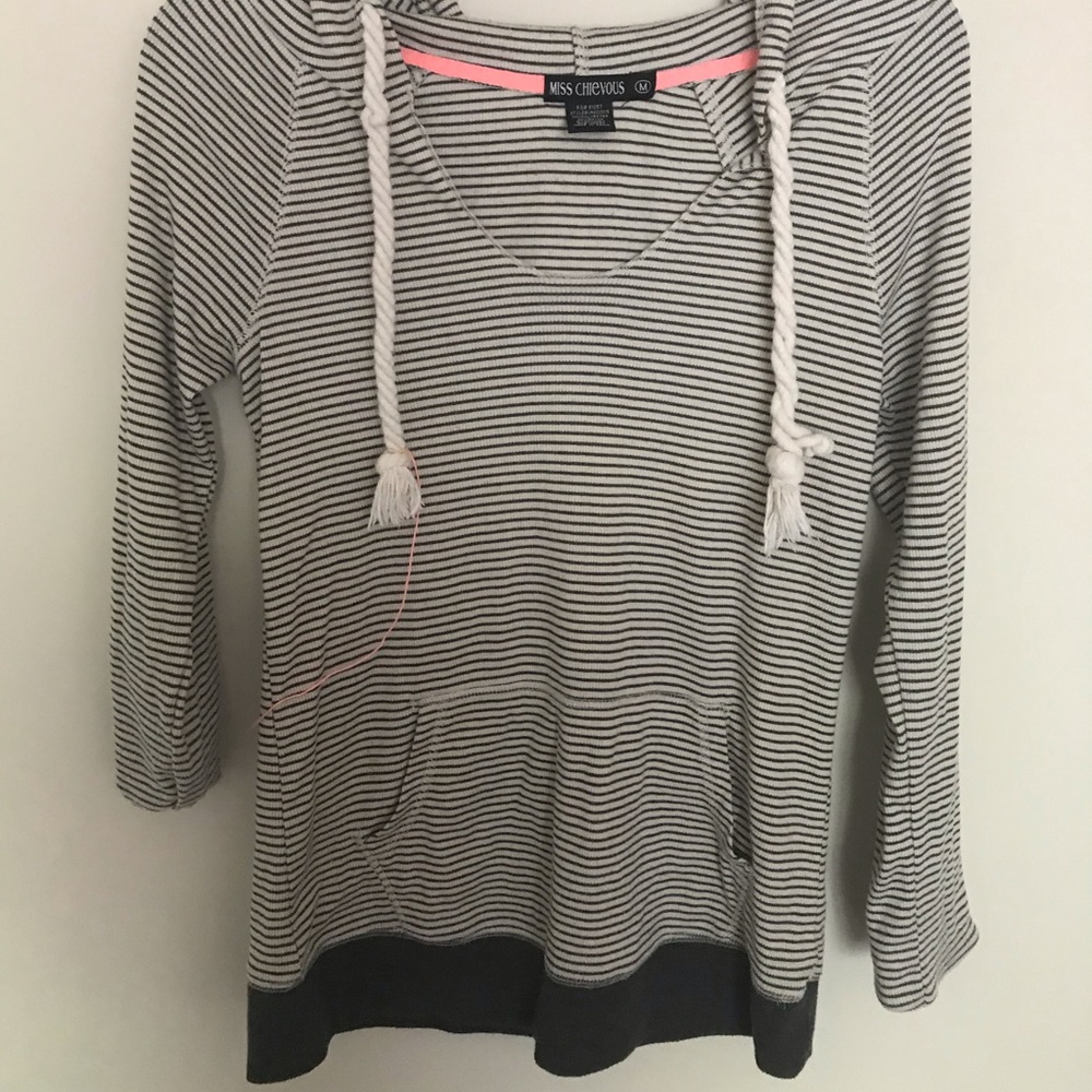 Gray striped sweatshirt.